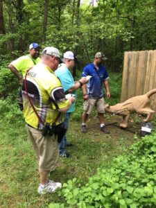 scoring during a 3D Shooting tournament at the outdoor archery range