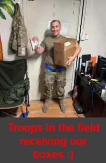 troops in the field reciving our boxes